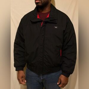 Woolrich nylon jacket in black with a red lining, size XL -Vintage